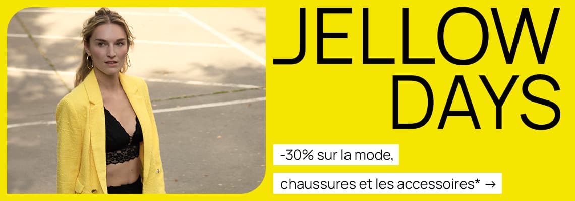 -30% sur la mode, chaussures et les accessoires – Femme en blazer jaune et haut noir dentelle, arrière-plan extérieur