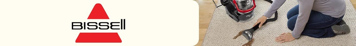 Bissell - Personne utilisant un nettoyeur de tapis rouge et noir sur une moquette beige.