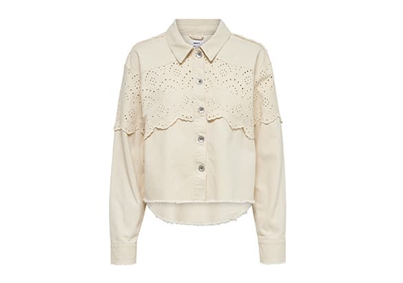 Sac à main noir texturé avec une fermeture dorée, posé devant un fond clair.