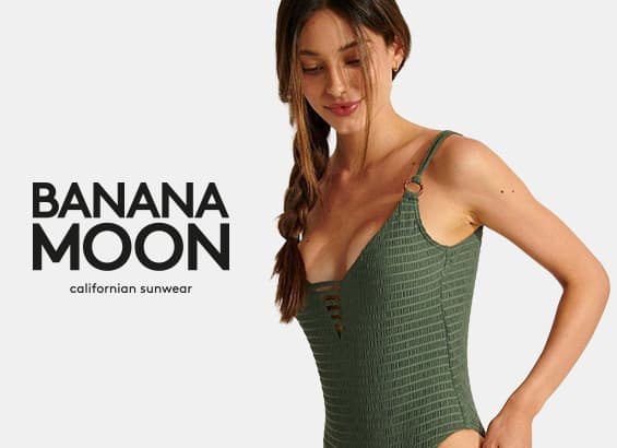 Banana Moon – Frau im grünen Badeanzug mit Zopffrisur